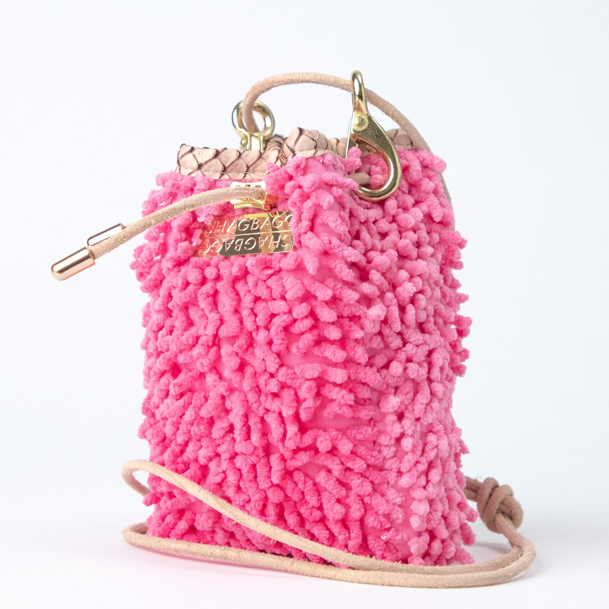 SHAGBAGG Drawstring Mini — Flamingo, neon bubblegum pink full SHAG crossbody bag with gold hardware and blush python collar, handmade Hollywood Los Angeles, front view