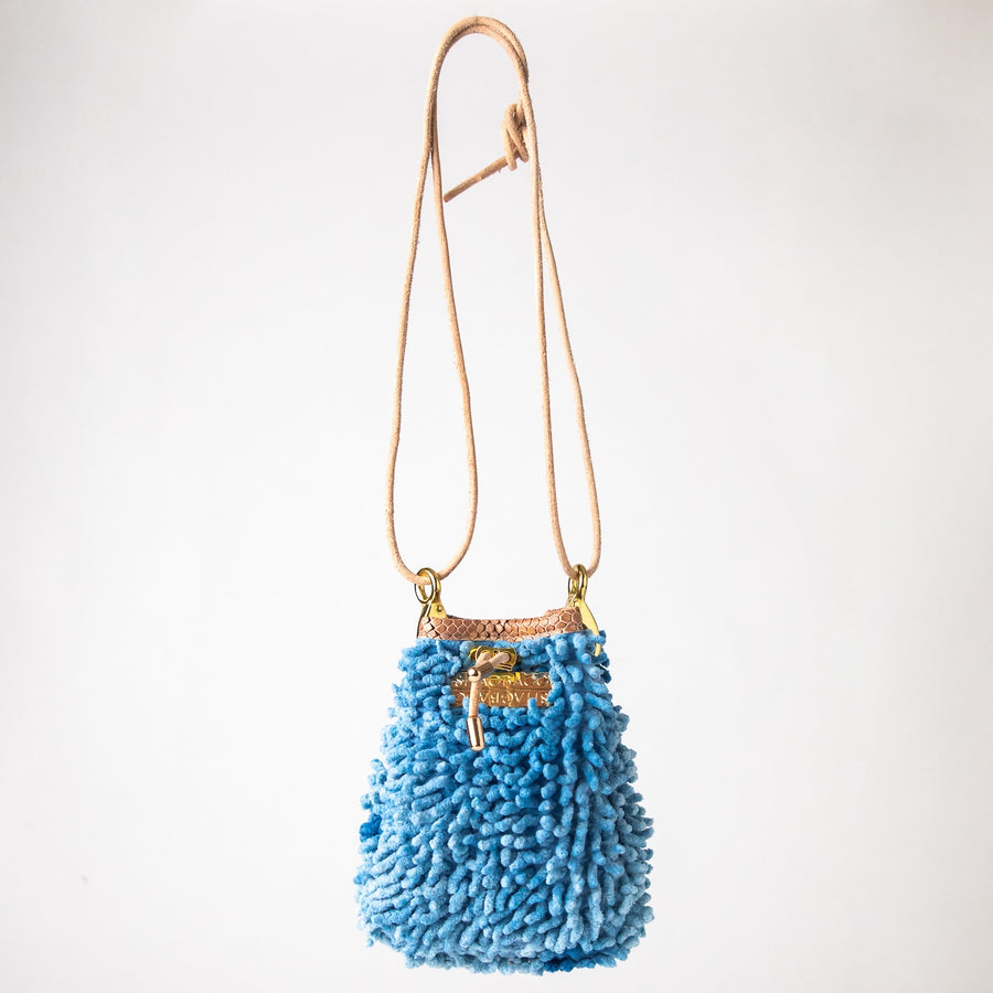 SHAGBAGG Drawstring Mini — Indigo Sister No. 3, vintage denim cornflower blue full SHAG crossbody bag with gold hardware and blush python collar, handmade Hollywood Los Angeles, front view