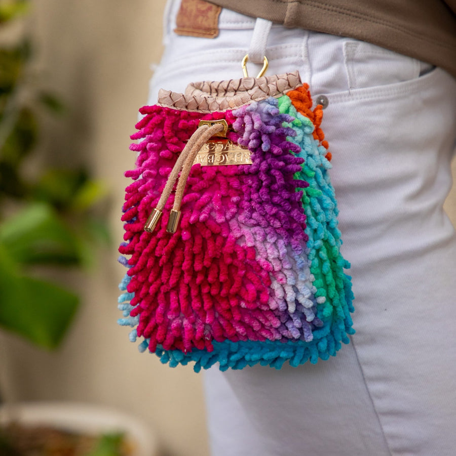 SHAGBAGG Drawstring Mini — Tie Dye Sister No. 1, full spectrum rainbow tie dye full SHAG crossbody bag in hot pink magenta purple lavender sky blue turquoise green orange, handmade Hollywood Los Angeles, front view