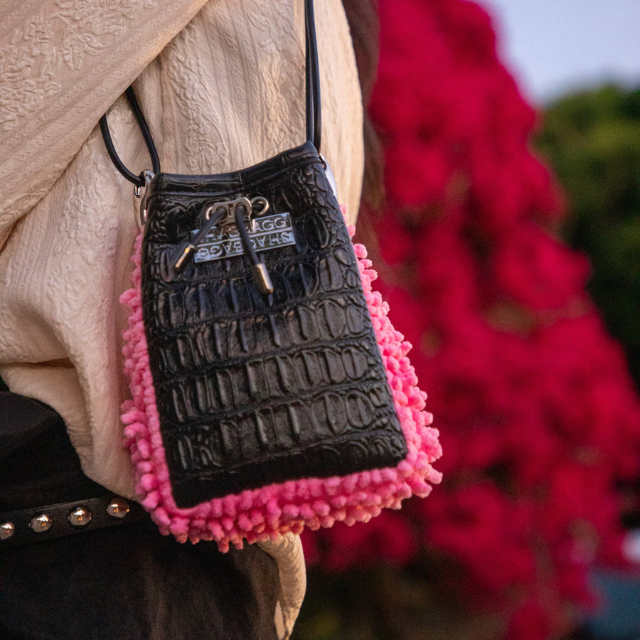 Hot pink SHAG mini drawstring bag with black embossed croc panel and silver hardware handmade in Los Angeles
