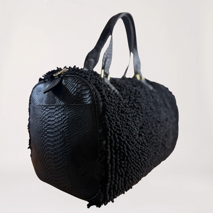 Front view of the SHAGBAGG Overnight SHAG Tote with faux-python panel and shag detailing.
