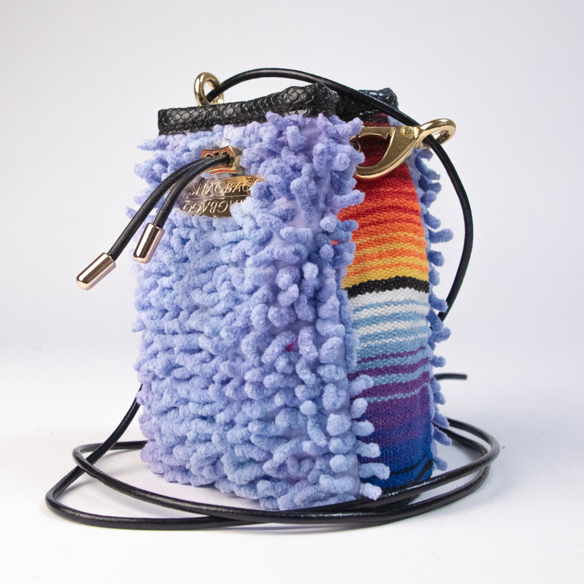 Lavender SHAG Drawstring SHAG Mini with vintage woven textile panel, gold hardware, and black leather cord strap handcrafted in Los Angeles