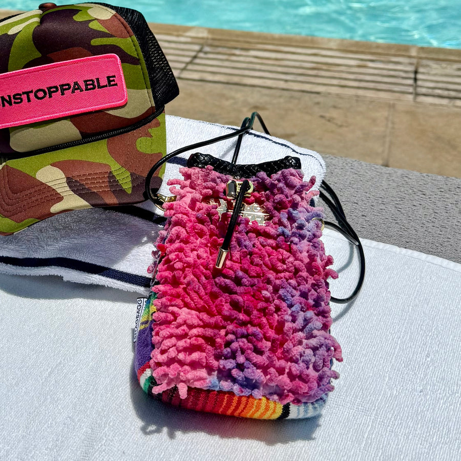 Hand-dyed SHAG Drawstring SHAG Mini with vintage woven textile panel, gold hardware, and black leather cord strap handcrafted in Los Angeles